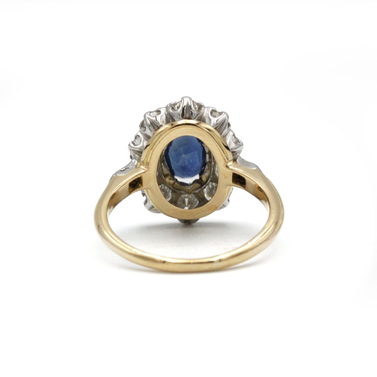 Bague marguerite en or jaune et platine avec diamants et saphir - Castafiore