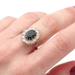 Bague Marguerite en or jaune, or blanc, saphir, et diamants - Castafiore