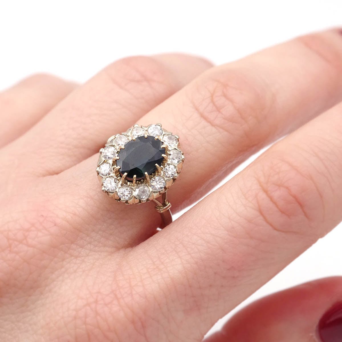Bague Marguerite en or jaune, or blanc, saphir, et diamants - Castafiore