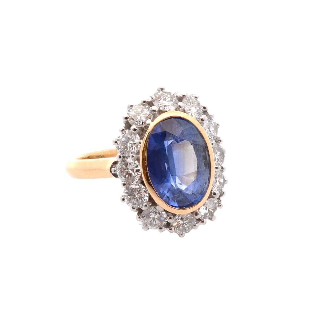 Bague Marguerite en or jaune, platine, saphir, et diamants - Castafiore
