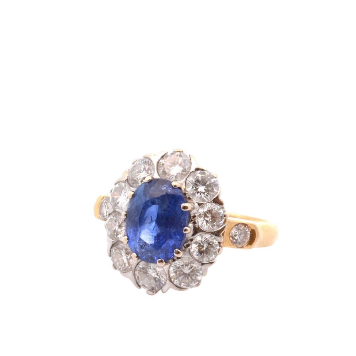Bague Marguerite en or jaune, platine, saphir et diamants - Castafiore