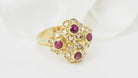 Bague marguerite en or jaune, rubis et diamants - Castafiore