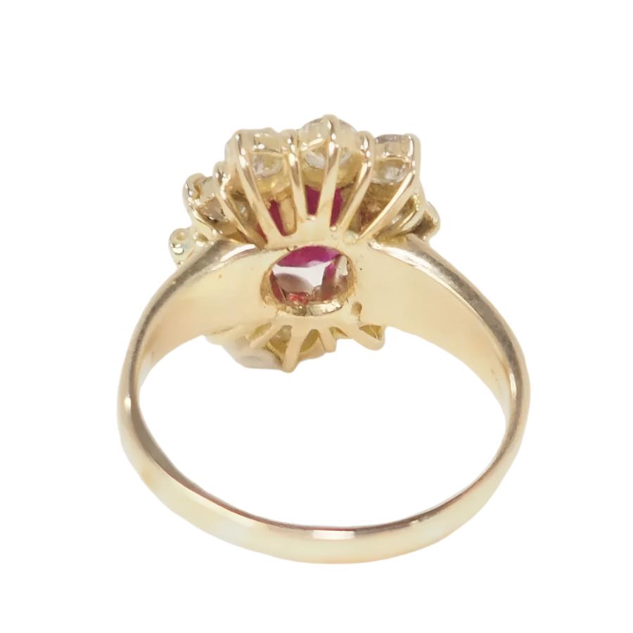 Bague marguerite en or jaune, rubis et diamants - Castafiore