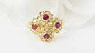 Bague marguerite en or jaune, rubis et diamants - Castafiore