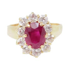 Bague marguerite en or jaune, rubis et diamants - Castafiore