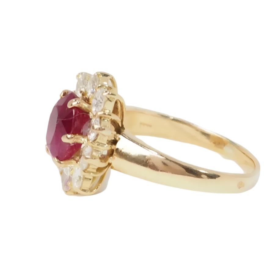 Bague marguerite en or jaune, rubis et diamants - Castafiore