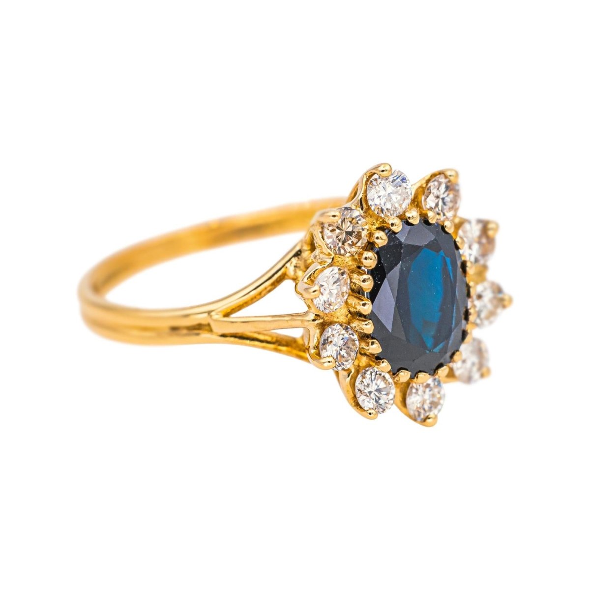 Bague Marguerite en or jaune, saphir et diamants - Castafiore