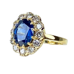 Bague marguerite en or jaune, saphir et diamants - Castafiore