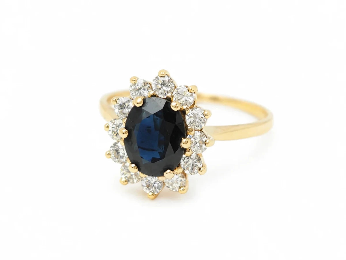 Bague Marguerite en or jaune, saphir et diamants - Castafiore