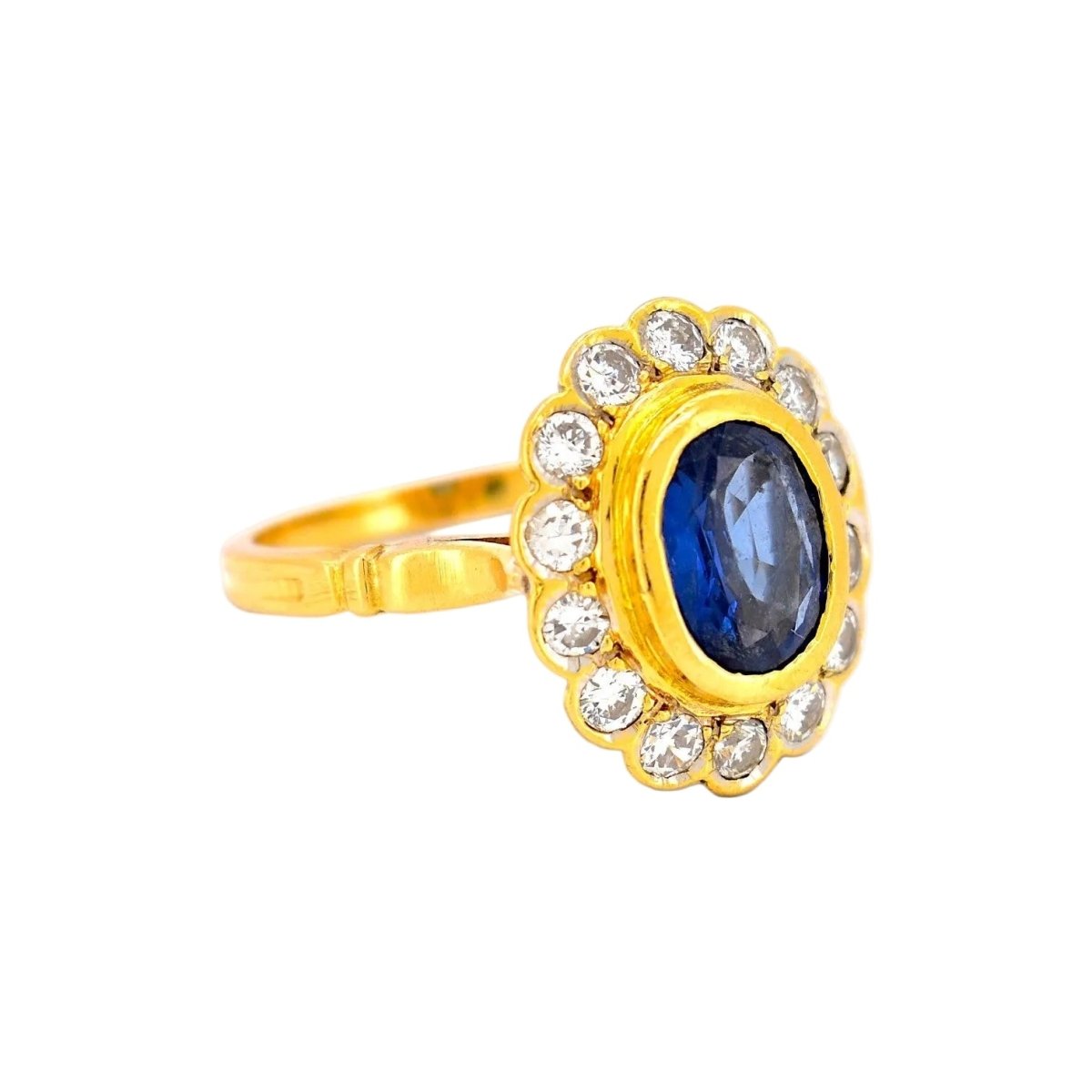 Bague Marguerite en or jaune, saphir et diamants - Castafiore