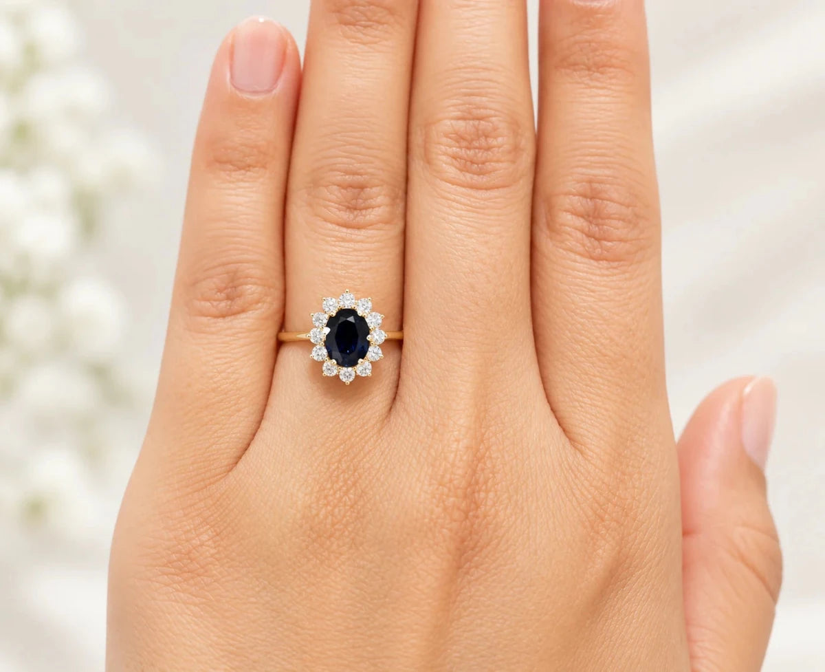 Bague Marguerite en or jaune, saphir et diamants - Castafiore