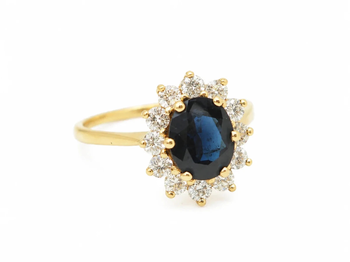 Bague Marguerite en or jaune, saphir et diamants - Castafiore