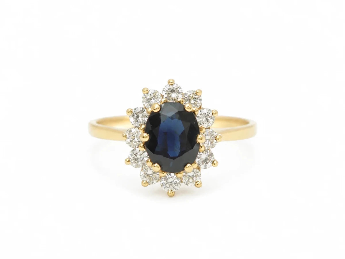 Bague Marguerite en or jaune, saphir et diamants - Castafiore