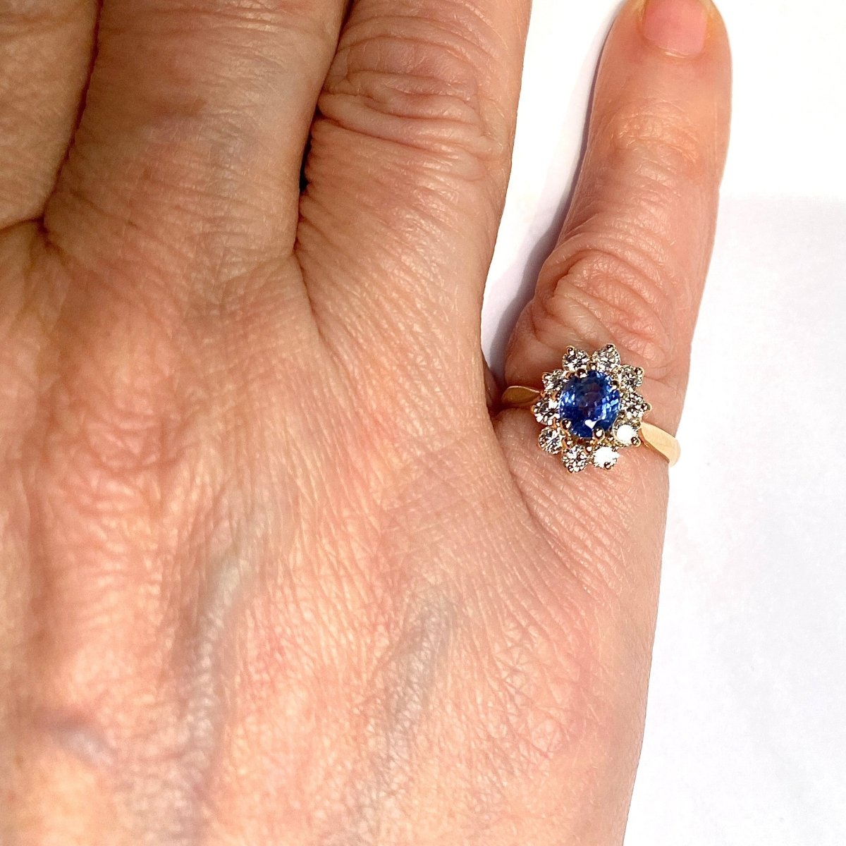 Bague Marguerite en or jaune, saphir et diamants - Castafiore