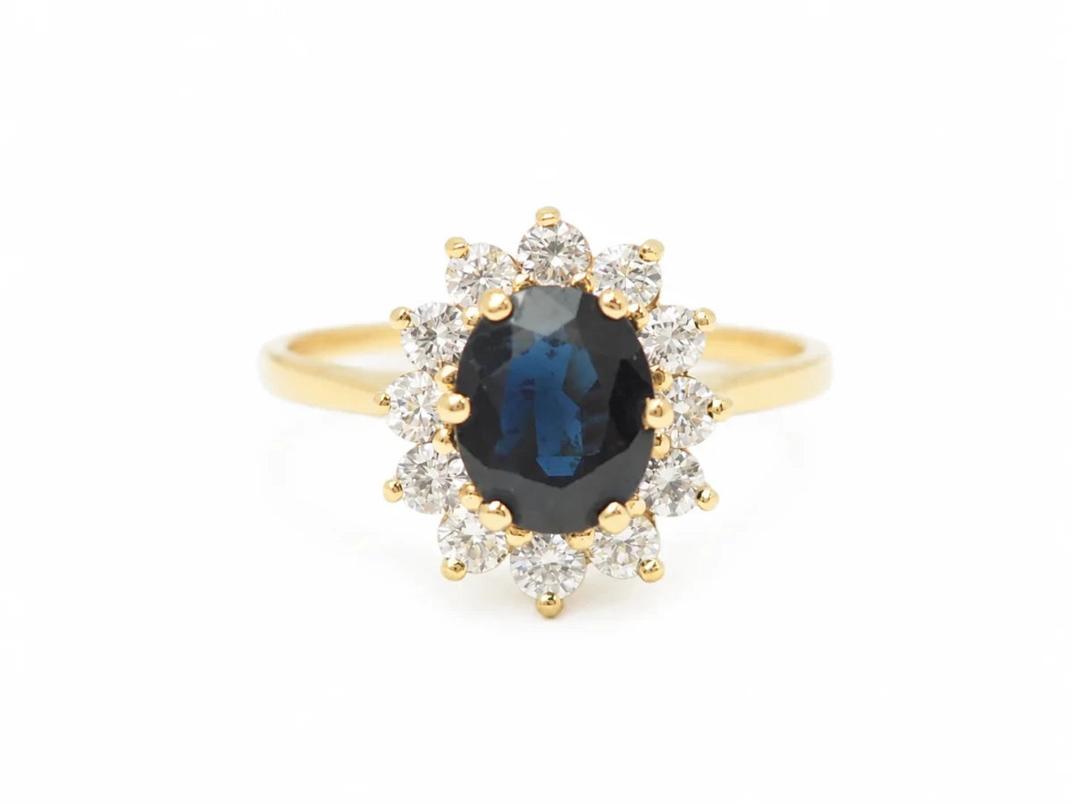 Bague Marguerite en or jaune, saphir et diamants - Castafiore