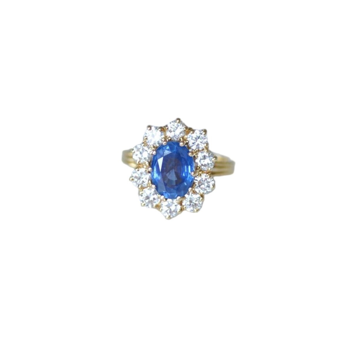 Bague Marguerite en or jaune, saphir, et diamants - Castafiore