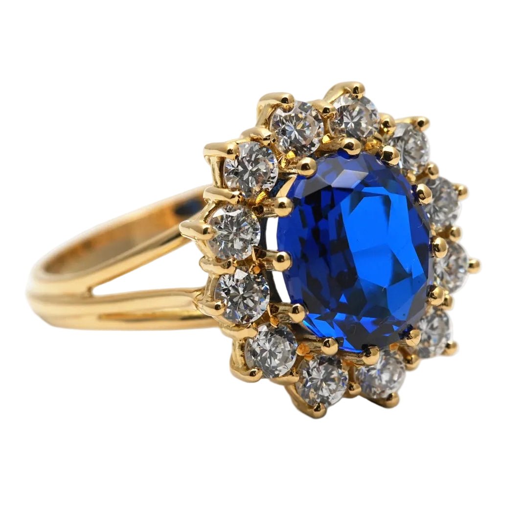 Bague Marguerite en or jaune, saphir et zirconiums - Castafiore