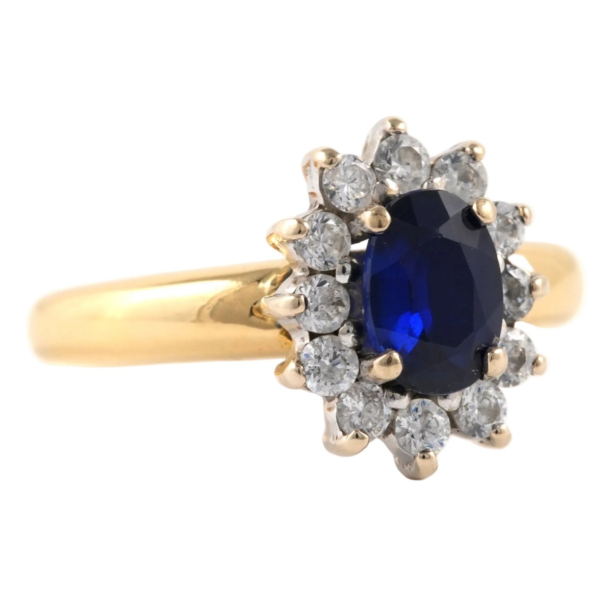 Bague Marguerite en or jaune, saphir et zirconiums - Castafiore