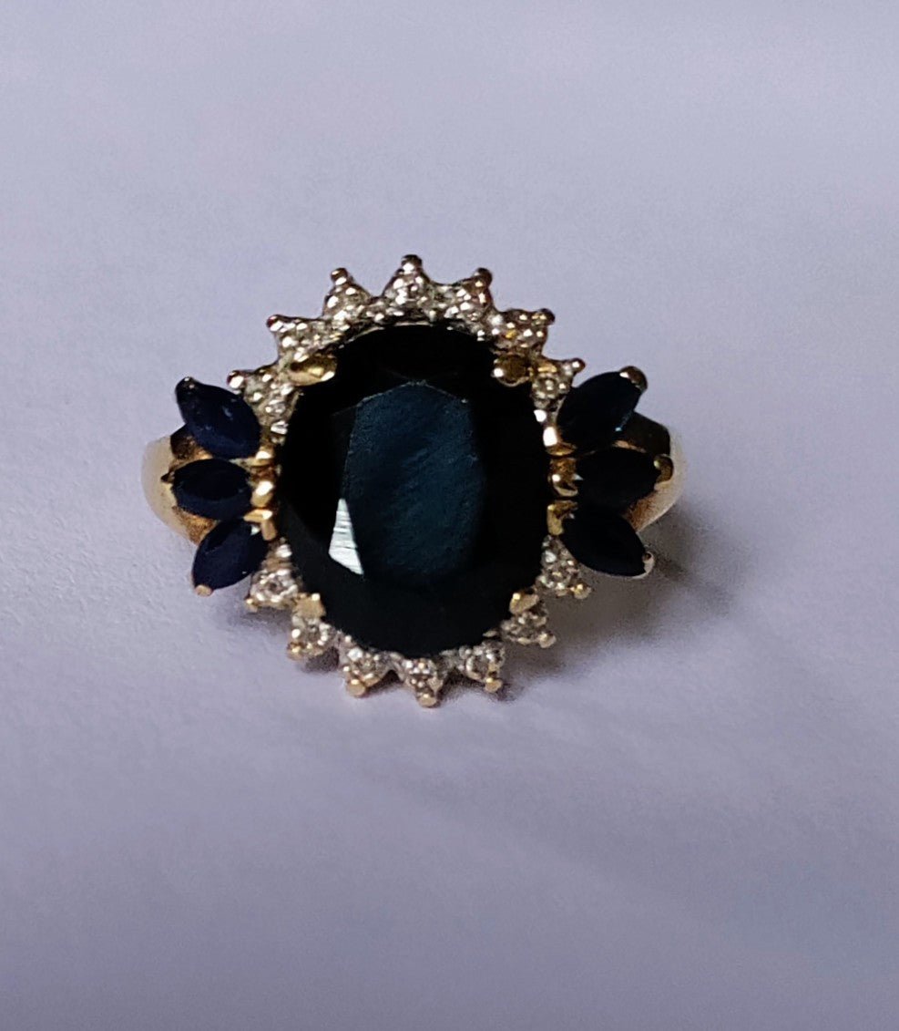 Bague Marguerite en or jaune, saphirs et diamants - Castafiore