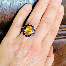 Bague Marguerite en or jaune, saphirs, et diamants - Castafiore
