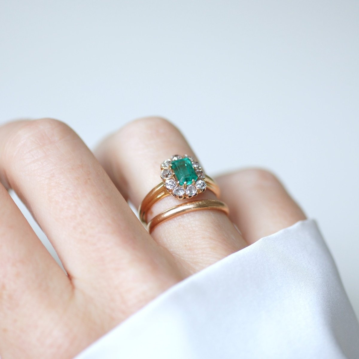 Bague Marguerite en or rose, émeraude, et diamants - Castafiore