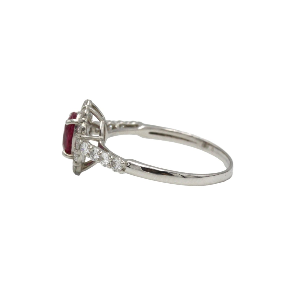Bague Marguerite en platine, rubis et diamants - Castafiore