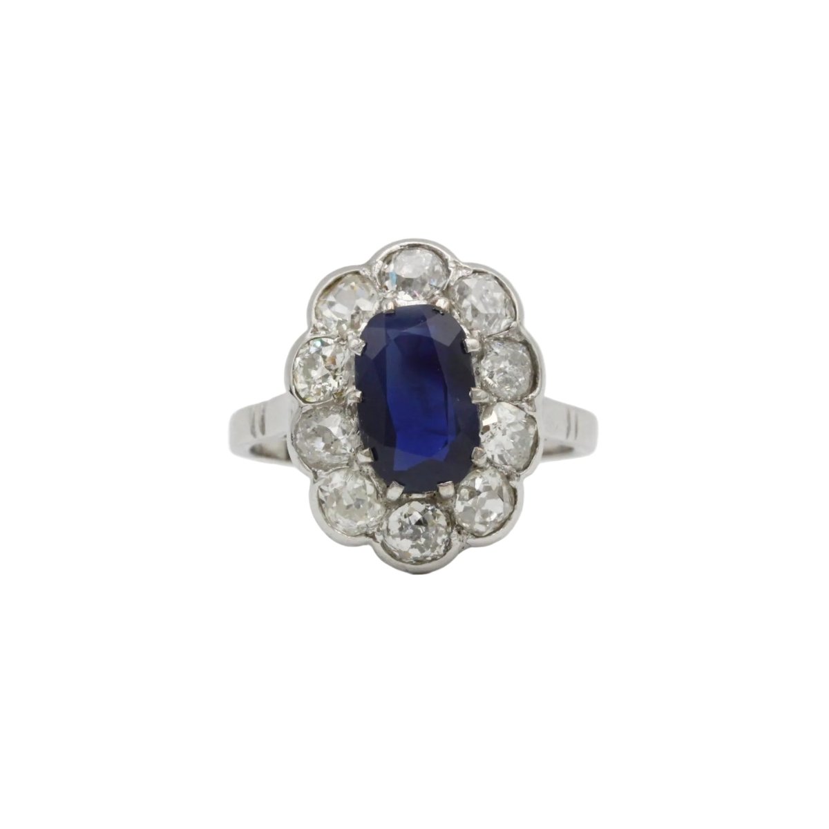 Bague Marguerite en platine, saphir et diamants - Castafiore