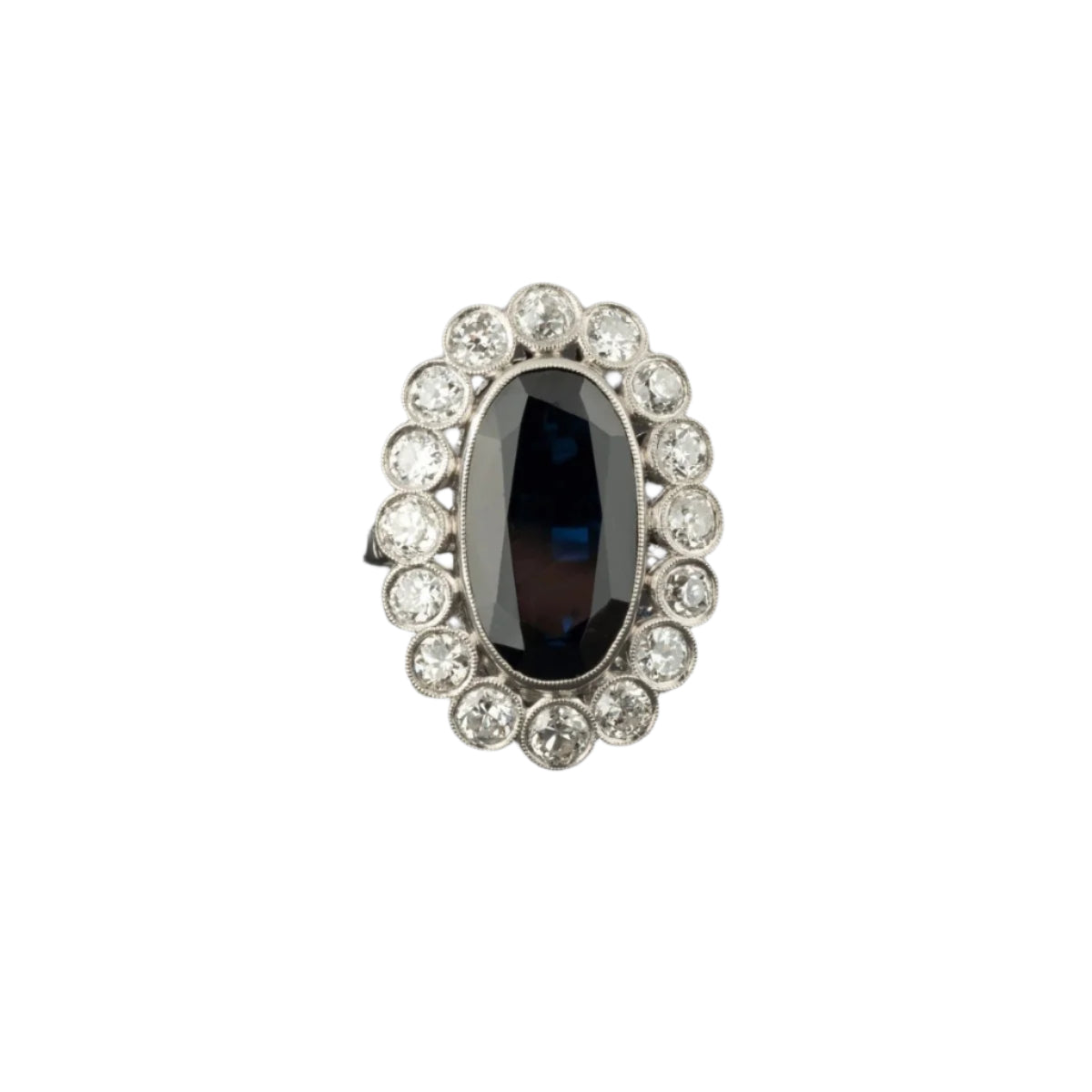 Bague marguerite en platine, saphir et diamants. - Castafiore