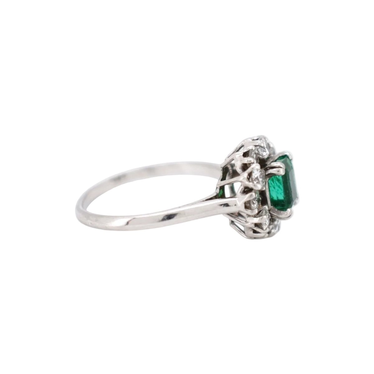 Bague Marguerite MELLERIO en platine, émeraude et diamants - Castafiore