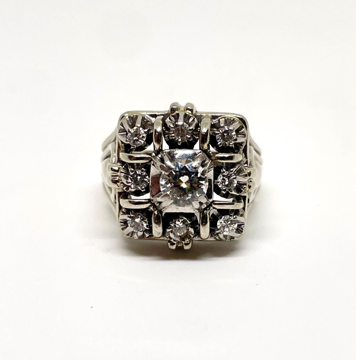Bague marguerite or gris et diamant central 0,45 cts - Castafiore
