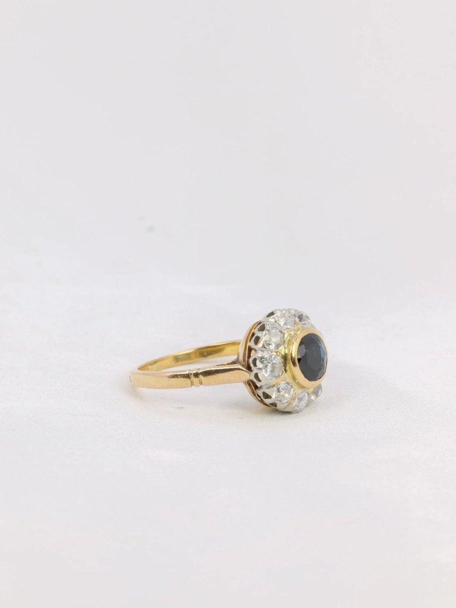 Bague marguerite or platine diamants saphir rond - Castafiore