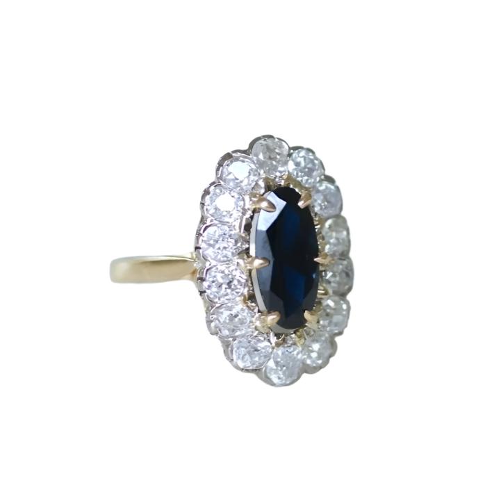 Bague marguerite saphir entourage diamants - Castafiore