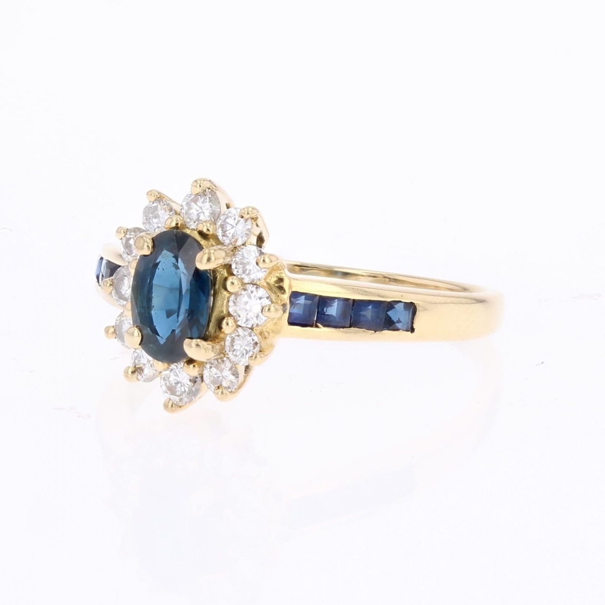 Bague marguerite saphirs diamants et saphirs calibrés - Castafiore