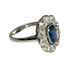 Bague marguerite vintage en or blanc saphir et diamants - Castafiore
