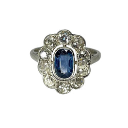 Bague marguerite vintage en or blanc saphir et diamants - Castafiore