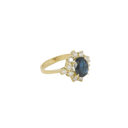 Bague marguerite vintage en or, saphir ovale et diamants - Castafiore