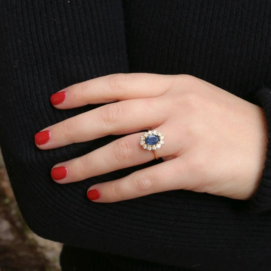 Bague marguerite vintage or diamants saphir ovale - Castafiore