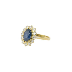 Bague marguerite vintage or diamants saphir ovale - Castafiore