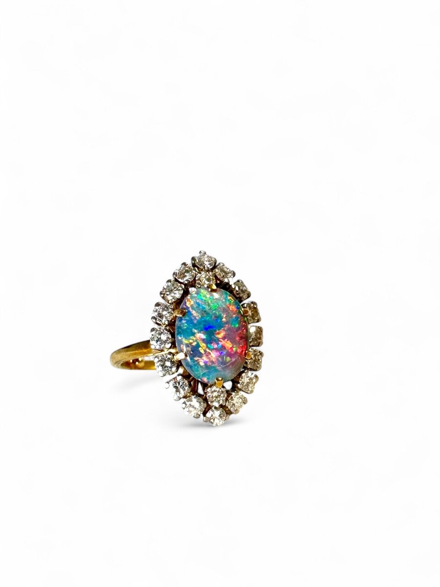 Bague Marquise en or jaune, platine, opale et diamants - Castafiore