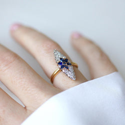 Bague Marquise en or jaune, platine, saphir et diamants - Castafiore