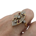 Bague Marquise en or jaune, rubis et diamants - Castafiore