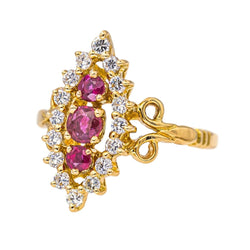 Bague Marquise en or jaune, rubis et diamants - Castafiore