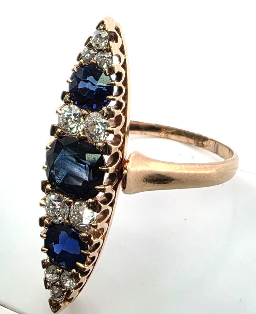 Bague Marquise en or jaune, saphirs et diamants - Castafiore