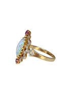 Bague marquise en or, opale, rubis et diamants - Castafiore