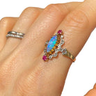 Bague marquise en or, opale, rubis et diamants - Castafiore