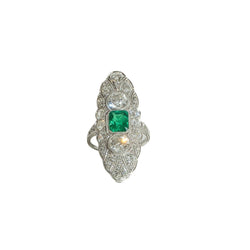 Bague Marquise en platine, émeraude et diamants - Castafiore