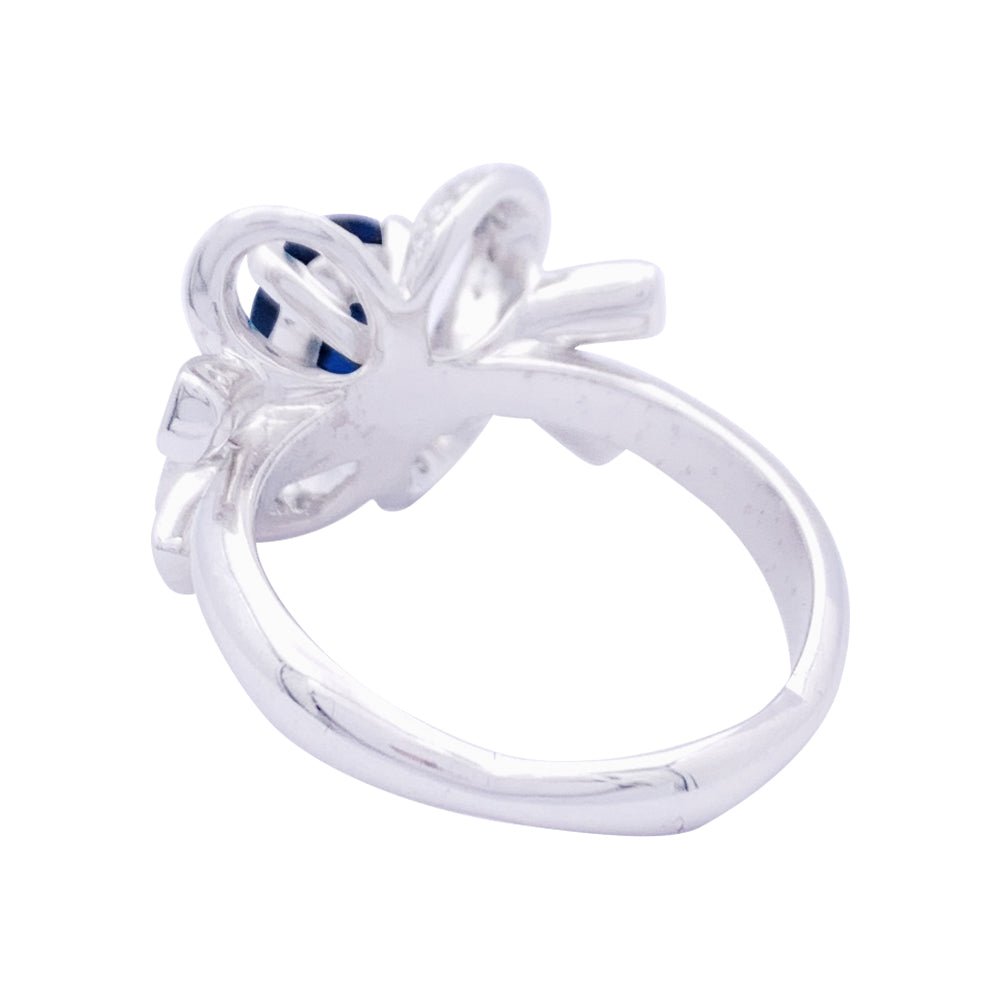 Bague Mellerio "Reine de Coeur Désirée" or blanc, diamants, saphir. - Castafiore