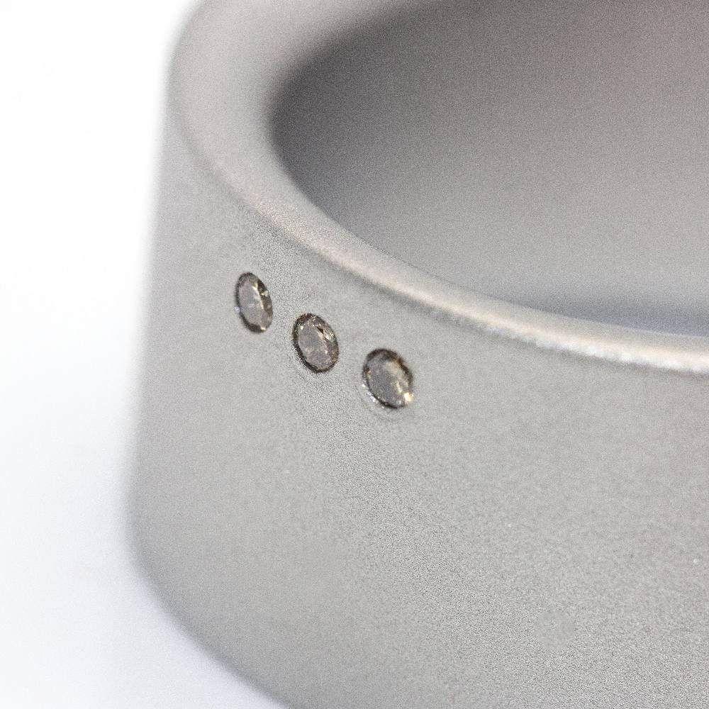 Bague NIESSING en acier et diamants - Castafiore