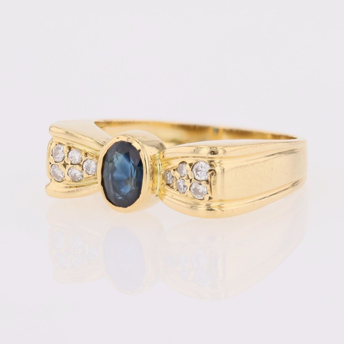 Bague nœud en or jaune saphir et diamants - Castafiore