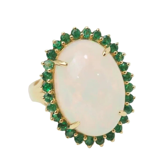 Bague ovale en or jaune, opale cabochon et émeraudes - Castafiore
